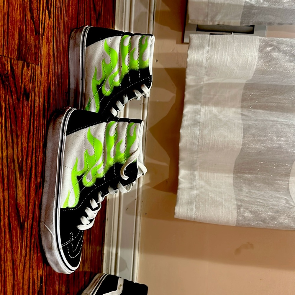 Size seven men’s vans green and black.